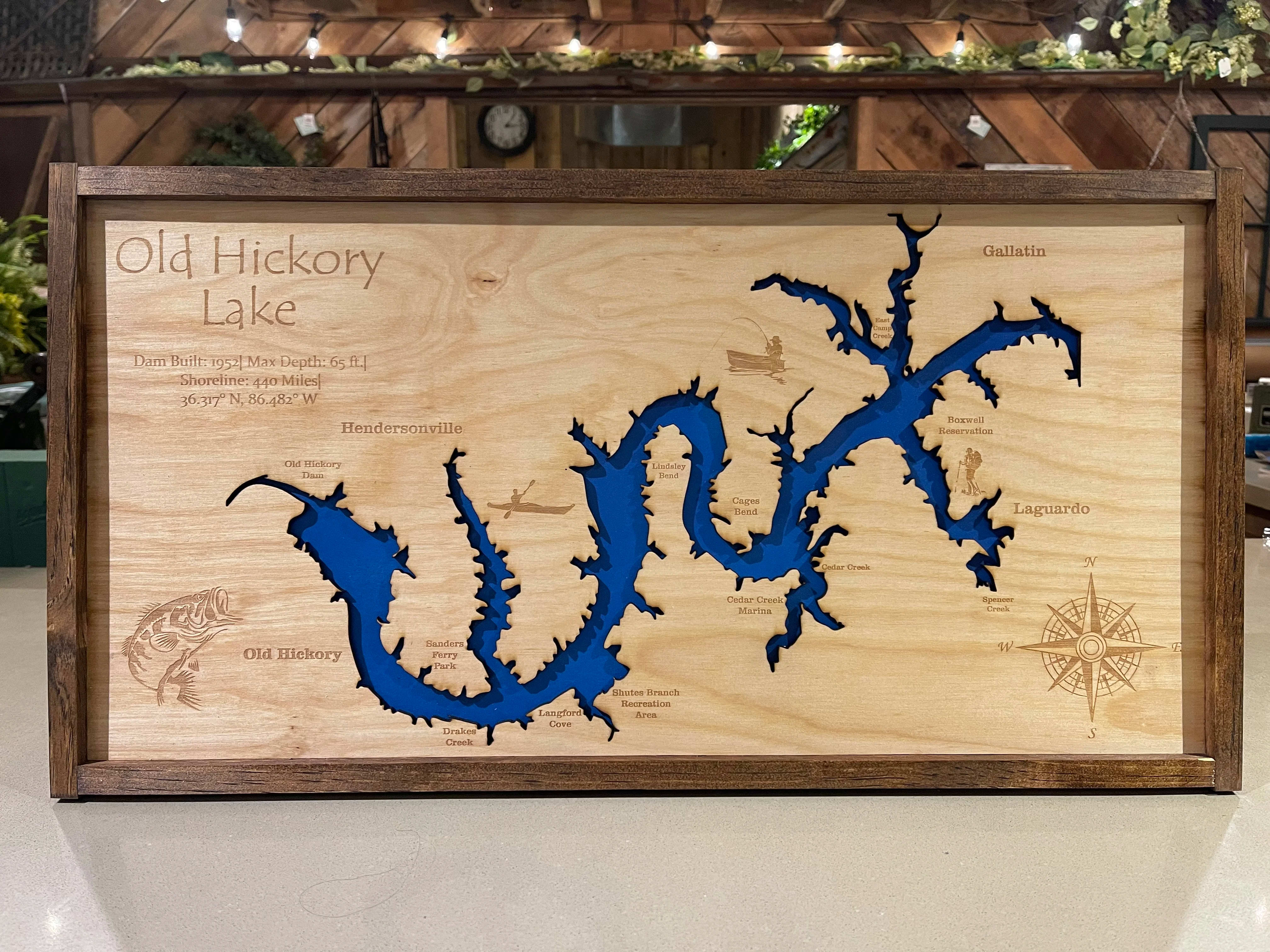 Lake sign - This is one of our lake signs made by our favourite local artist. We have all the surrounding lakes. These are perfect for any lake love or gentlemen in your life. They measure 13” x25”. We ask you give us 2 days notice for these lakes signs as they tend to sell fast. The regular price is just the sign the deluxe price will include a bow and a touch of greenery and the premium price will include a substantial bow with multiple greenery. 