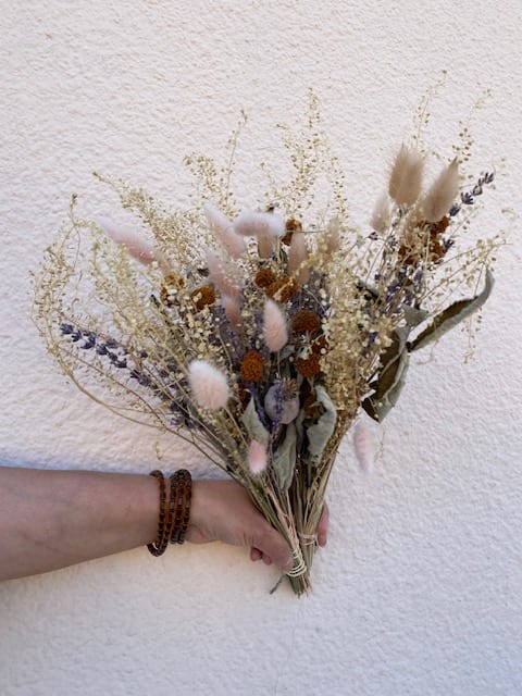 Dried bouquet with pink bunny tails and beige grasses