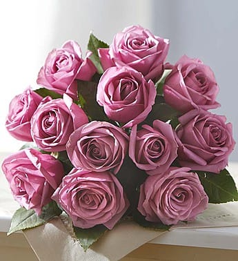 Bouquet of pink roses with green leaves