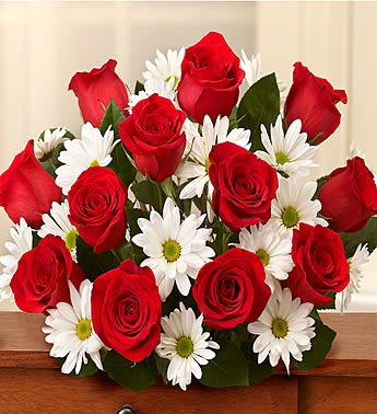 Bouquet of red roses and white daisies