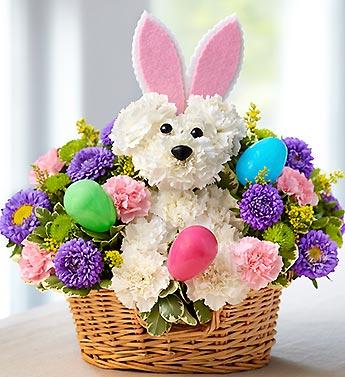 Flower basket with a plush bunny and colorful Easter eggs