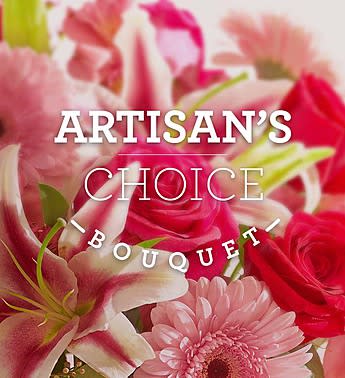 Bouquet of pink and red flowers with lilies and roses