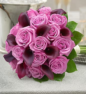 Pink rose bouquet with dark purple calla lilies