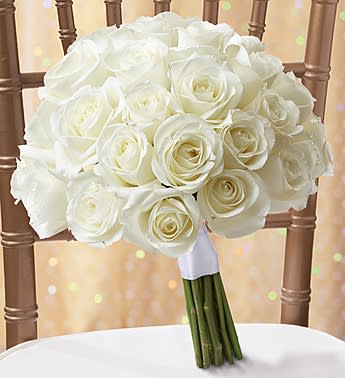 White rose bouquet with wrapped stems