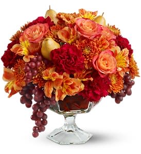 Rose Sangria - Sangria is a surprising mix of sweet, tart and bold - and so is this wildly beautiful floral arrangement of salmon roses and bronze and maroon blossoms, plus grapes, pears and oak leaves! It makes a striking and unusual centerpiece for a fall dinner party, wine tasting or any special occasion.