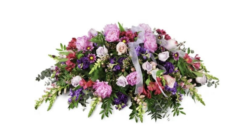 Large mixed floral spray with pink, purple, and white blooms