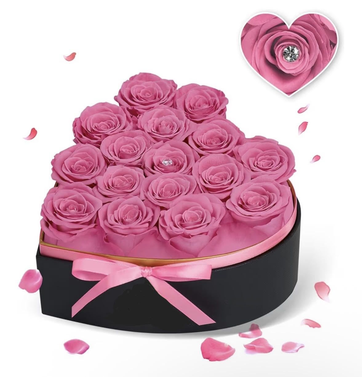 Timeless Preserved 16 Pink Roses - A lush cluster of preserved REAL 16 pink roses packed into a black heart-shaped presentation box creates an immediately romantic, keepsake-worthy gift for anniversaries, birthdays, Mother's Day or a "just because" surprise.  