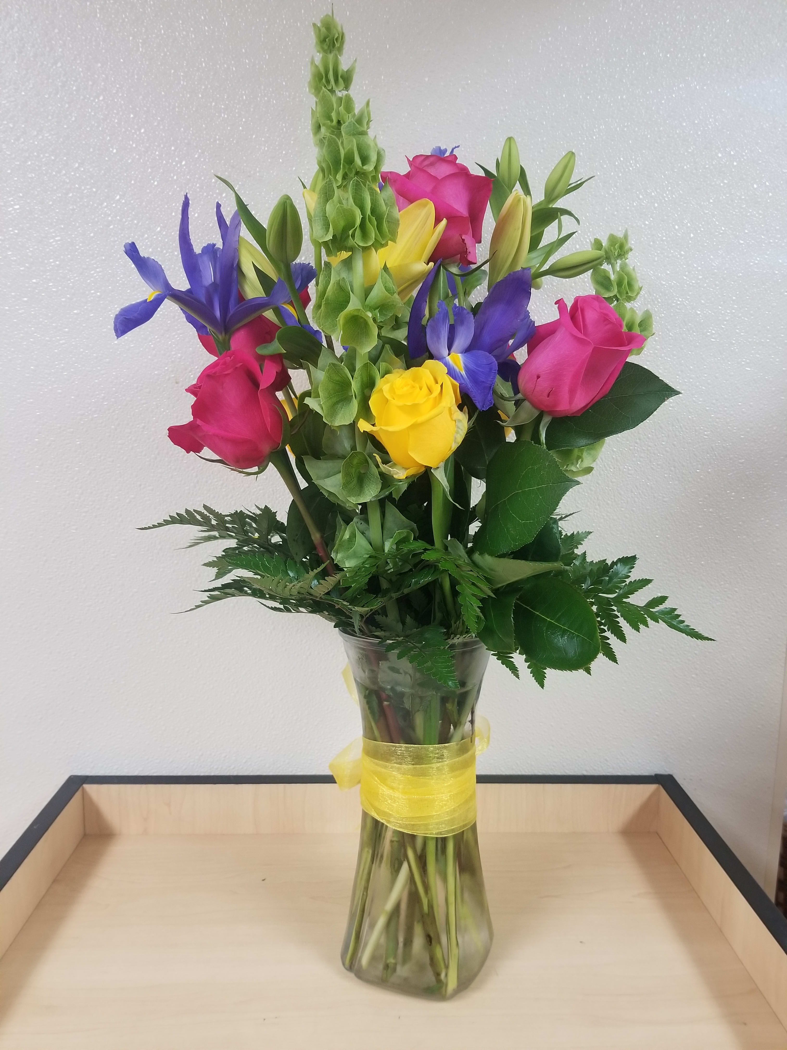 Spring Bouquet - Lovely Spring Boquet with Iris, Yellow and Hot Pink Roses,Lilies and Bells of Ireland
