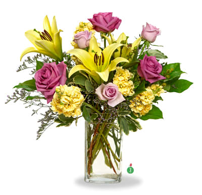 Night &amp; Day - The sunny hues of daytime mingle with the dusky tones of night in this medley of yellow and purple blossoms that will be welcomed at any time, and for any occasion. A unique pairing of colors, and a stunning presentation.