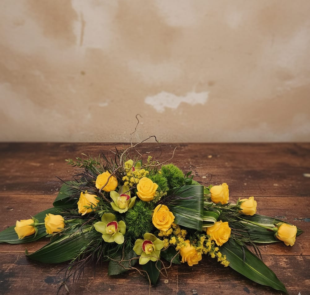 Olympia Flowers – Artful Yellow Roses and Green Orchids - Modern Orchid &amp; Rose Design – Flower Delivery in Lacey, WA  Make a bold and unforgettable statement with this one-of-a-kind floral arrangement from Specialty Floral Design, your local florist offering flower delivery in Lacey, WA. Featuring radiant yellow roses paired with striking green orchids, this modern, sculptural design is created for those who see flowers as art.  At Specialty Floral Design, we specialize in artistic, custom floral designs. Our work is never cookie-cutter—each arrangement is handcrafted with creativity, care, and a signature style that ensures no two pieces are ever exactly alike. Your flowers are truly one-of-a-kind.  Perfect for: Anniversary flowers Valentine’s Day flowers Celebrating love, milestones, and meaningful moments  We proudly offer same-day flower delivery in Lacey, Olympia, Tumwater, and surrounding areas, making it easy to send a unique and memorable gift right when it matters most.  Because each design is custom and artist-driven, slight variations may occur, adding to the beauty and exclusivity of your arrangement. To customize or order, call 360-688-6608 today.