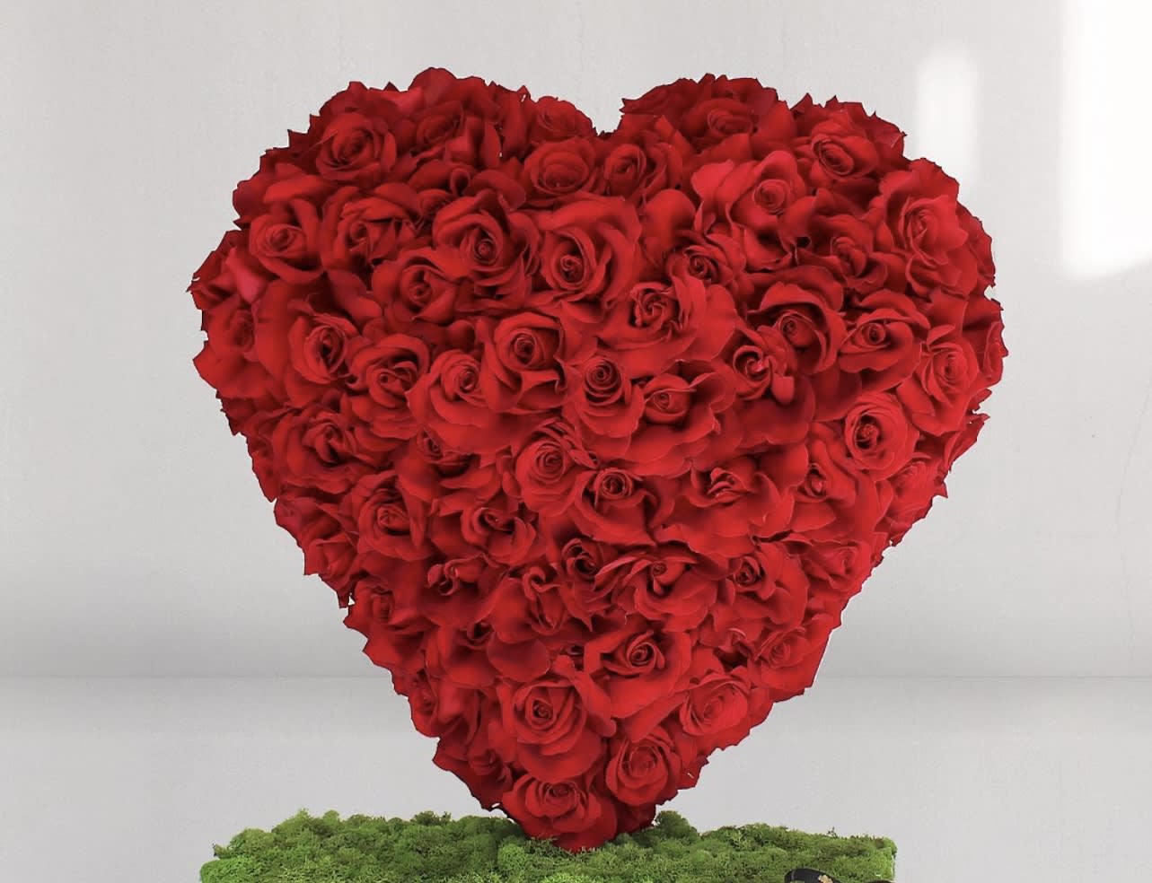 I give you my heart  - Impress with this bold standing heart. Send someone this soulful floral gift and there’ll be no mistaking that you’re giving them your heart! This heart of love is made entirely of red roses.  