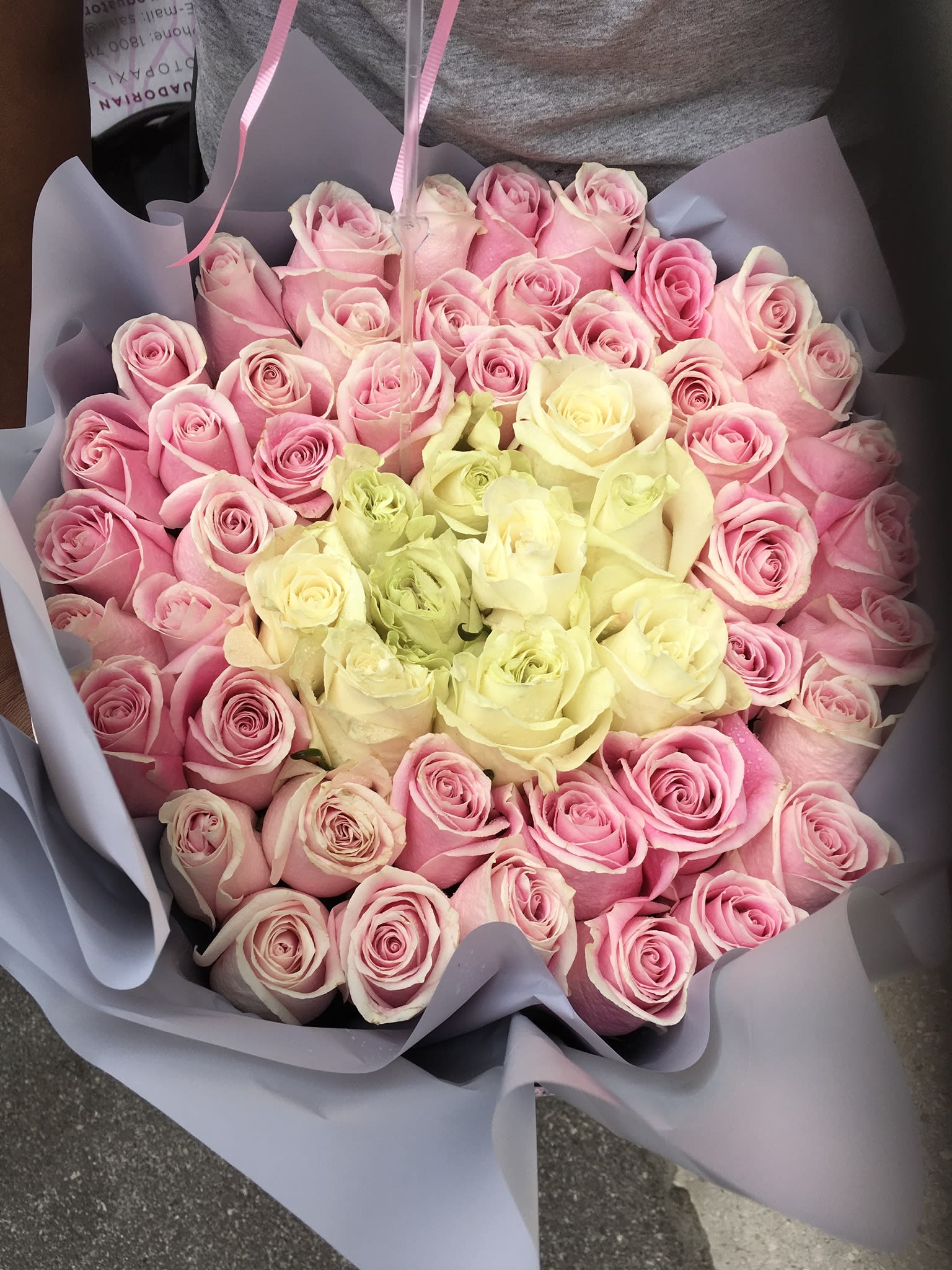 Roses by Design - 50-100 roses in  any color in a decorative hat box. You can custom design this. Just tell us what you want.