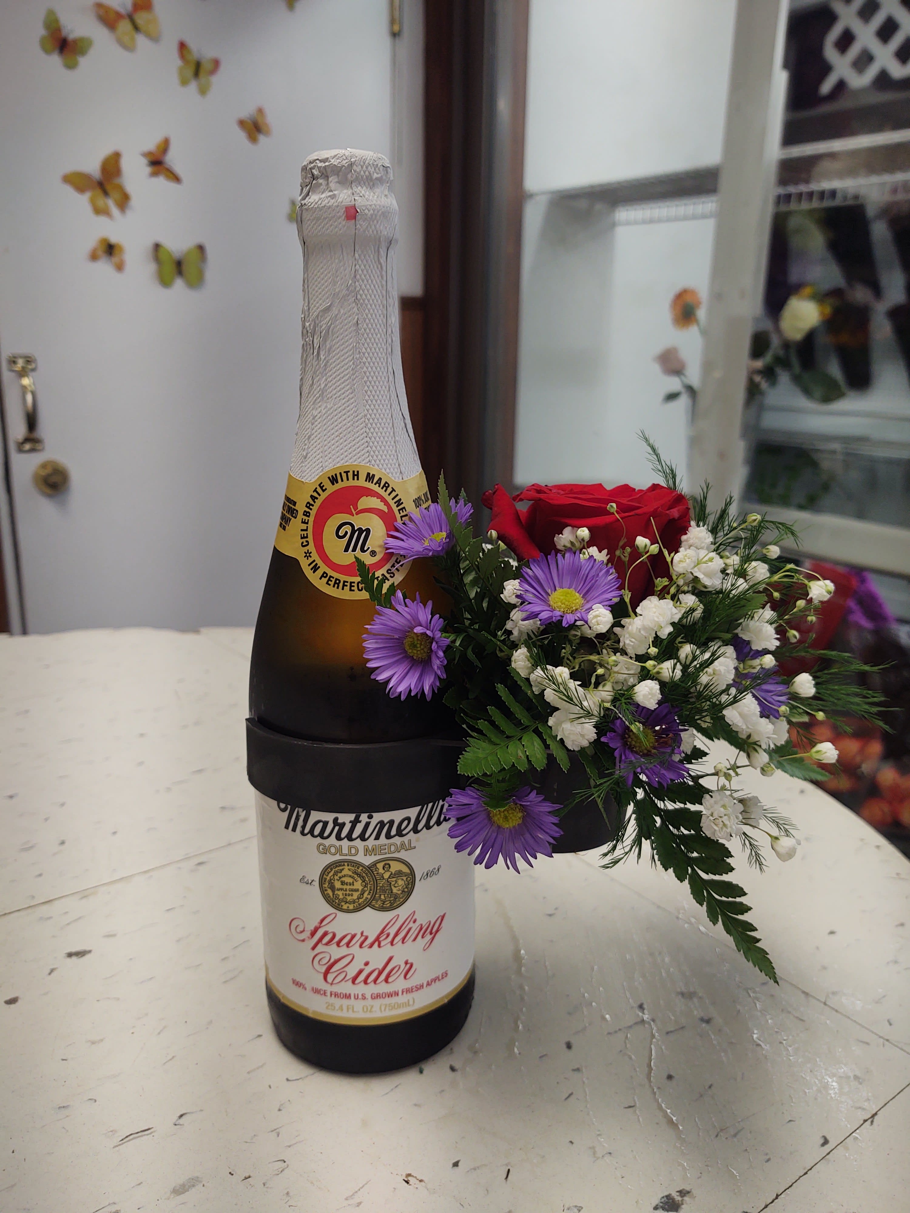 Sparkling Cider &amp; Flowers - One bottle of sparkling cider with a small cup of brightly colored flowers!