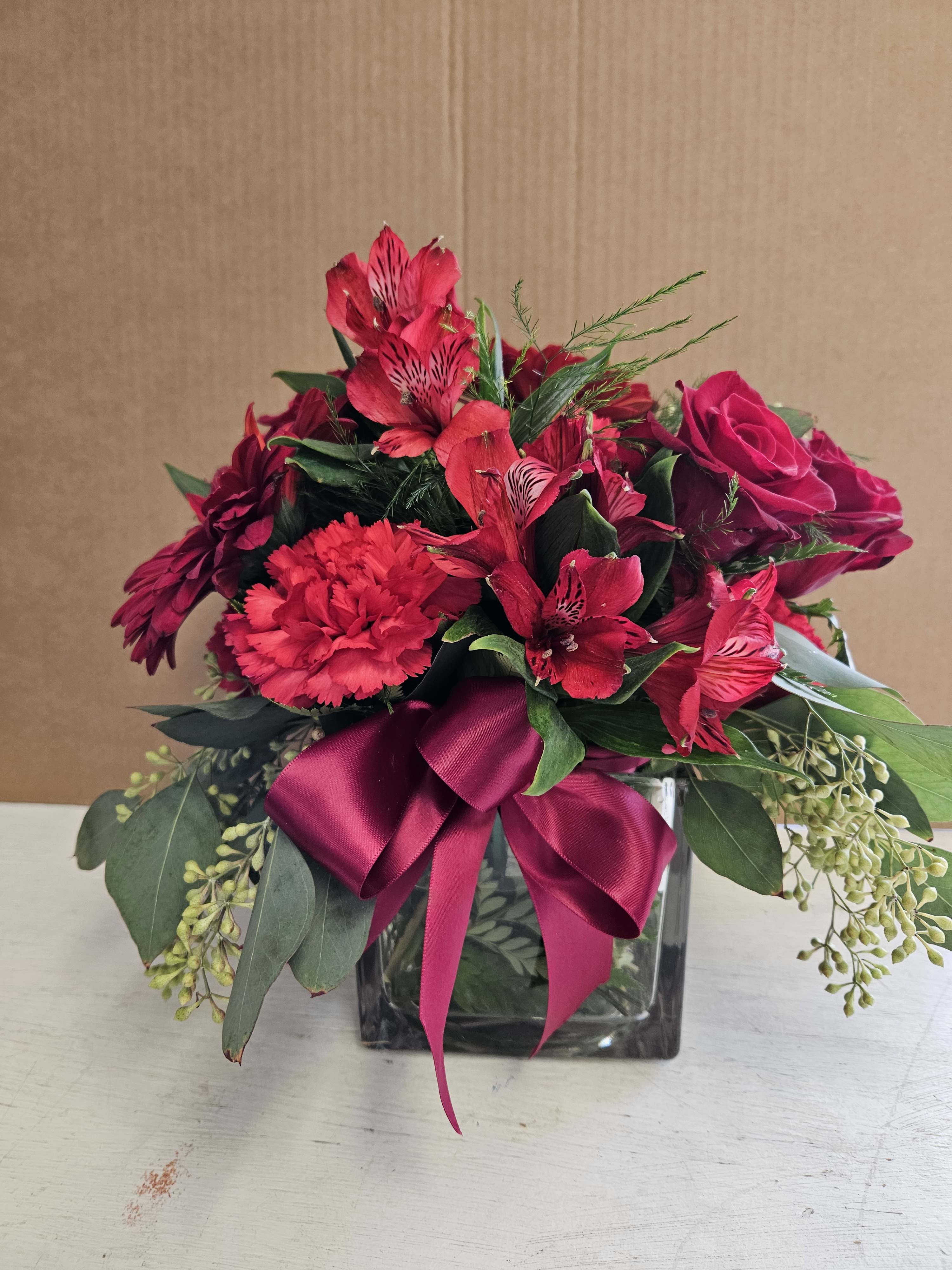Glass cube, all red flowers! - Clear glass cube with an assortment of all RED  flowers!