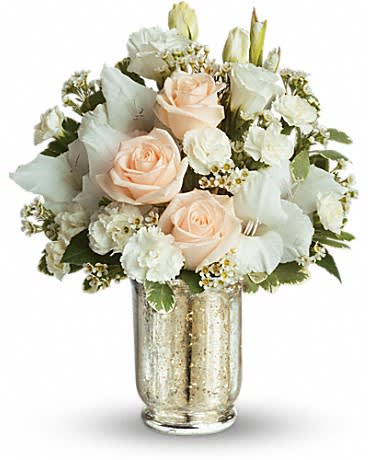 Peach and white rose bouquet in a gold vase