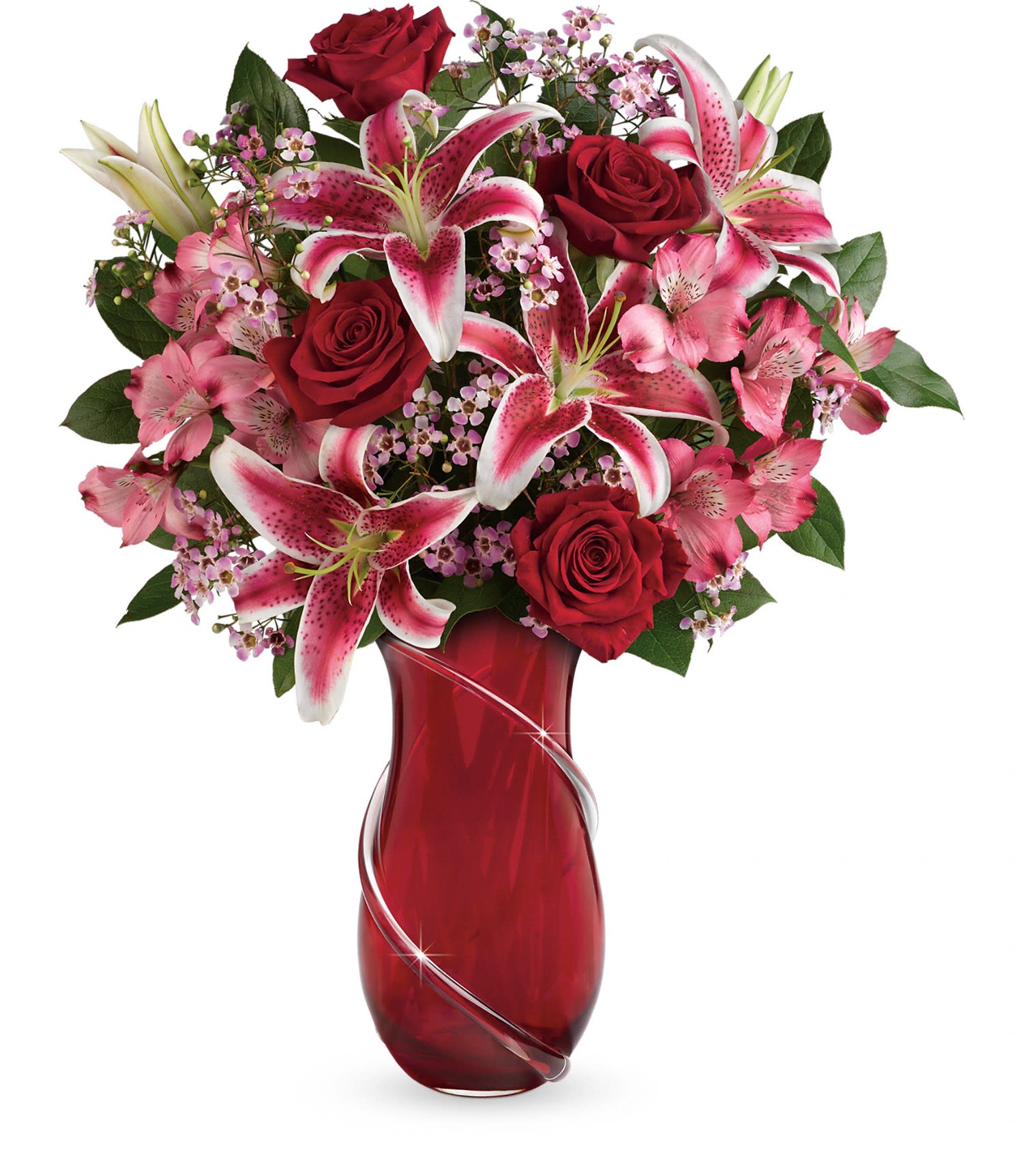 Teleflora's Wrapped With Passion Bouquet - Long stemmed red roses, pink stargazer lilies and dark pink alstroemeria are artistically arranged with lavender waxflower and lemon leaf. Delivered in a Wrapped With Passion vase. Approximately 18 1/2" W x 21 3/4" H