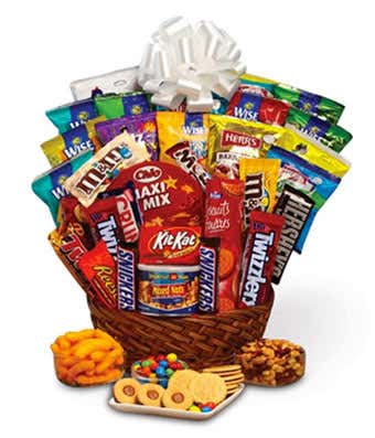 Basket of assorted candy and snack packs with a white bow