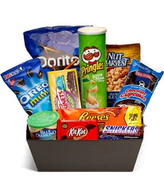 Assorted snack gift basket with chips, candy, and ice cream