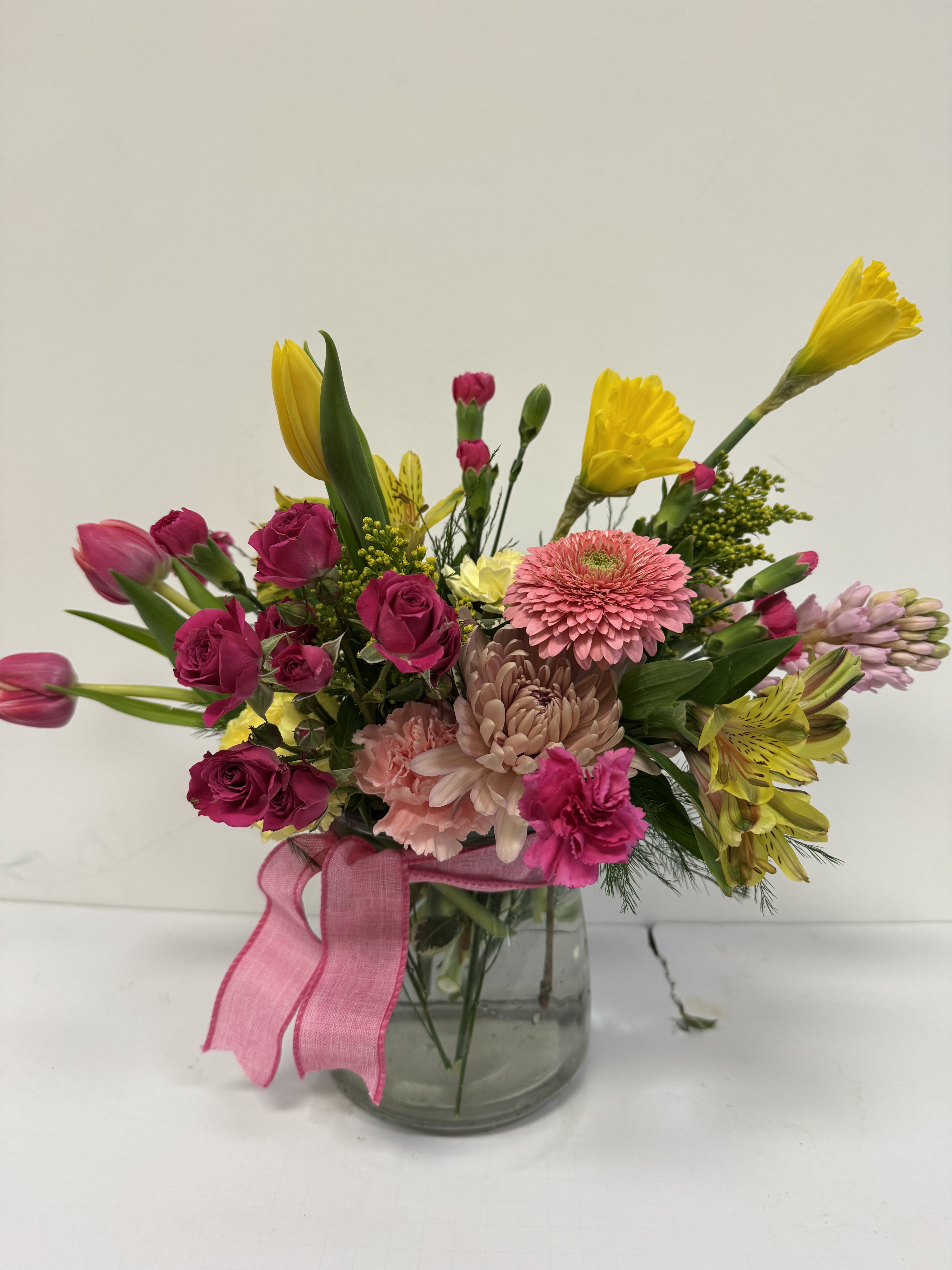Cheerful - Bright florals in shades of pinks and yellows. 