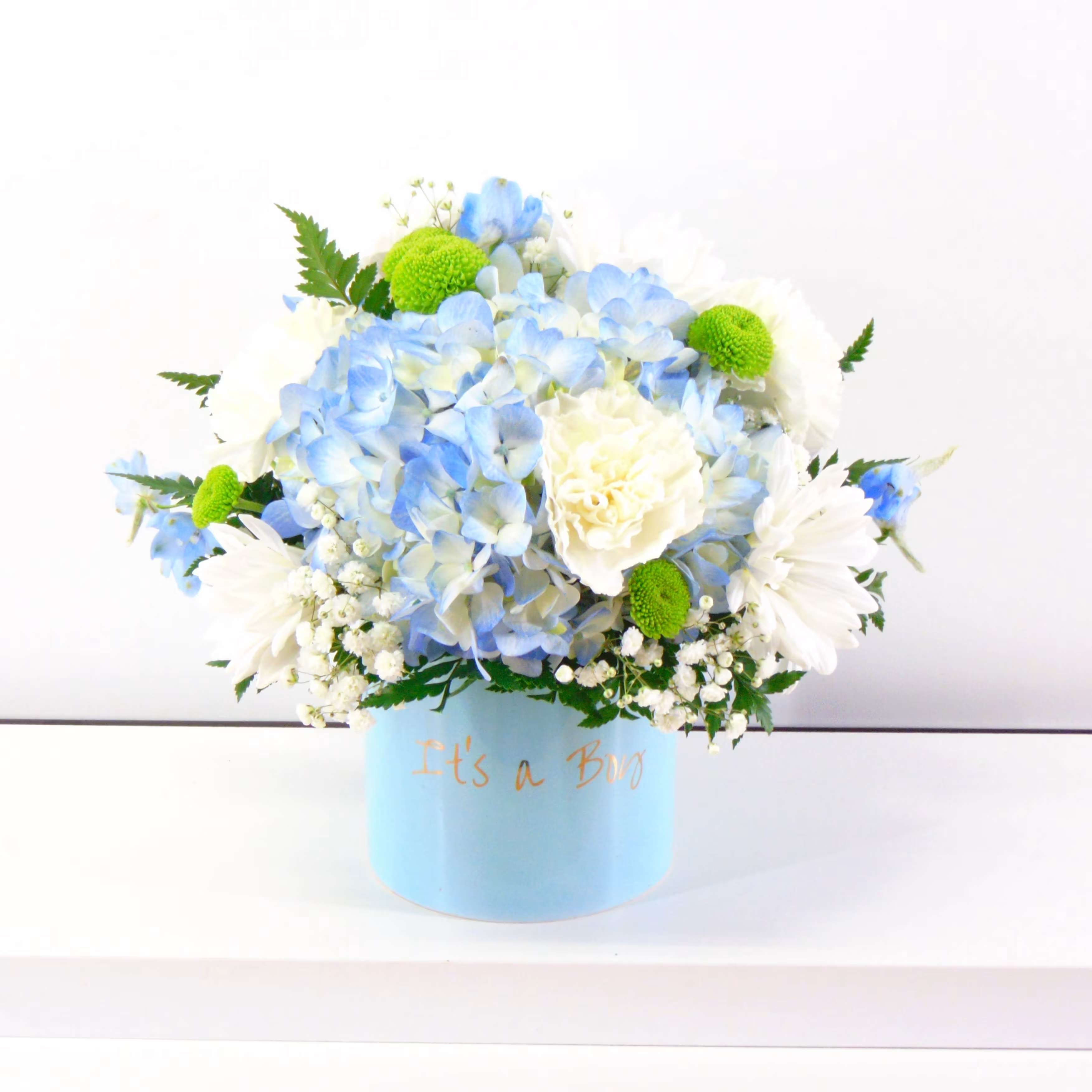 It's a Boy  - Send a handsome and cute arrangement to the sweetest family/ friend of little boy. Flowers can change with customer and staff  approval please call 