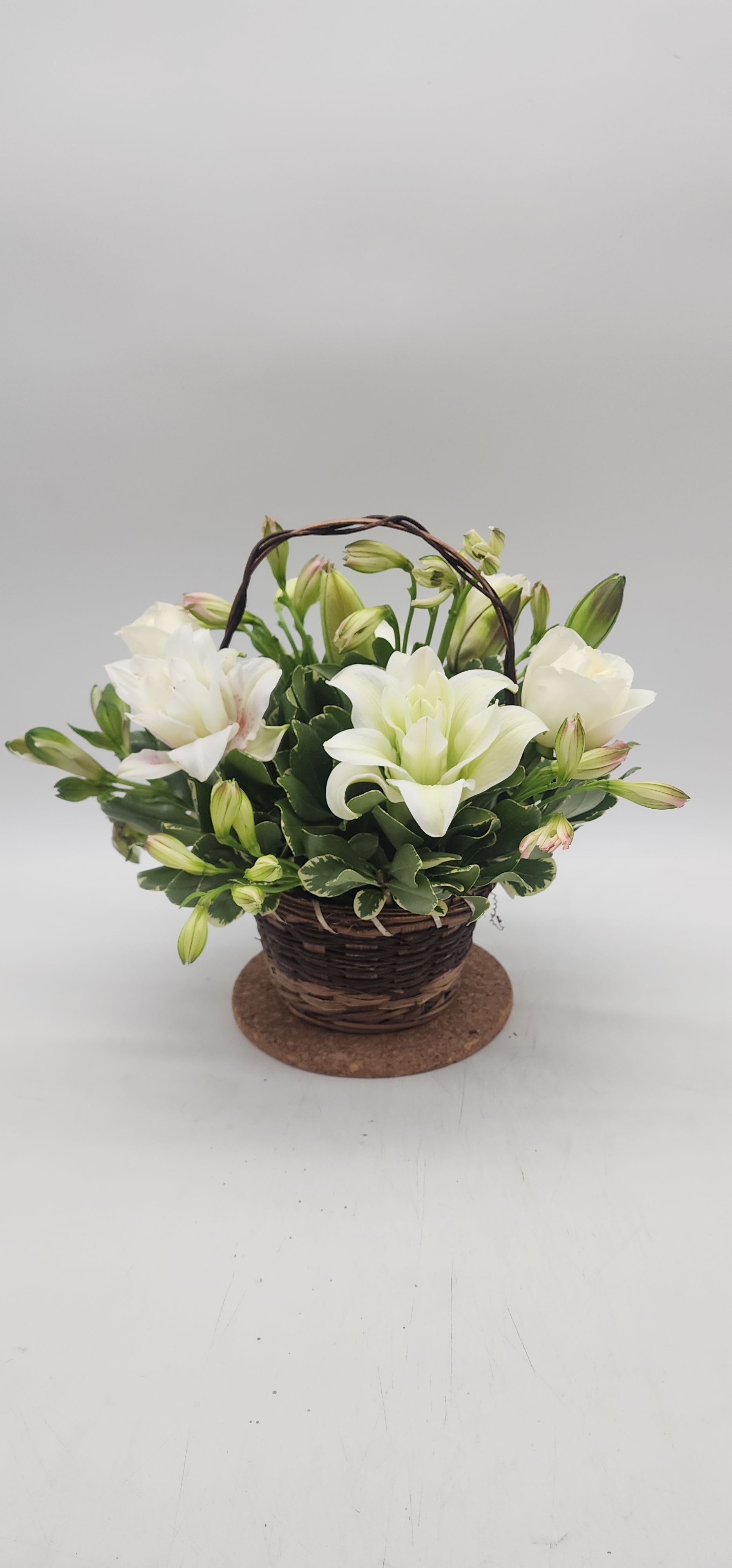Eternal Affection - ETERNAL AFFECTION ARRANGEMENT Share how much you care with an abundance of elegant white florals. Designed in a basket, Eternal Affection features alstroemeria, roses, poms and more. A fitting gift to send for sympathy, get well or any occasion.  Please Note: The bouquet pictured reflects our original design for this product. While we always try to follow the color palette, we may replace stems to deliver the freshest bouquet possible, and we may sometimes need to use a different basket. DETAILS  Designed by florists, ready to display. For long–lasting blooms, add water daily. Pet Safety Precautions: This bouquet or plant may include flowers and foliage that are known to be toxic to pets. To keep them safe, be sure to keep this arrangement out of your pet's reach. 