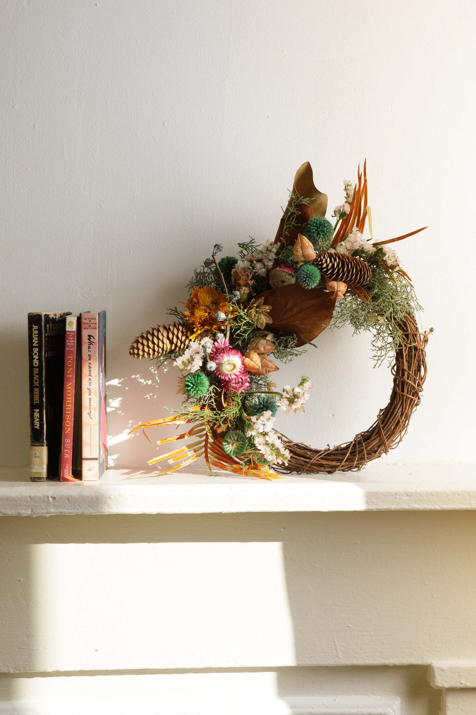 Dried Wreath  - The 18in  - Gift one of our handmade wreaths made with florals dried in-house and fresh winter foliage on a natural grapevine wreath. Each wreath is unique from the next and colors are limited but requests are welcomed. 