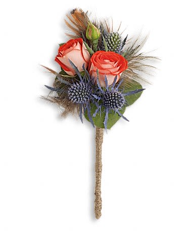Boho Dreams Boutonniere - This exotic mix of blue eryngium and pheasant feathers is sure to turn heads.