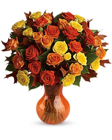Teleflora's Fabulous Fall Roses - Autumn is a many-splendored thing and this glorious bouquet is proof. The season's most amazing flowers in a chic serendipity vase - what a spectacular splash of color and style! Bask in it.