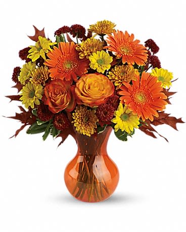 Teleflora's Forever Fall - Bring the glorious colors of autumn indoors year-round with spectacularly radiant flowers in a bright orange Serendipity vase. It is a beautiful gift - and a beautiful bargain too. A win-win for everybody.