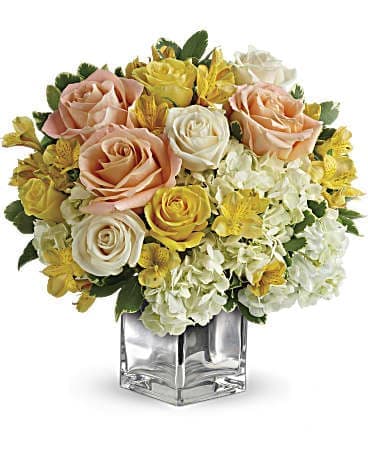 sweet  and sunshine  - The cheerful bouquet includes white hydrangea, yellow roses, crème roses and yellow alstroemeria accented with fresh greenery.