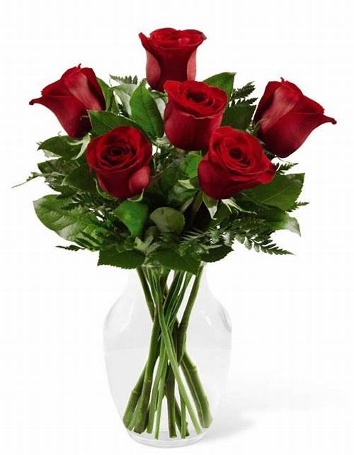 Bouquet of red roses in a clear glass vase