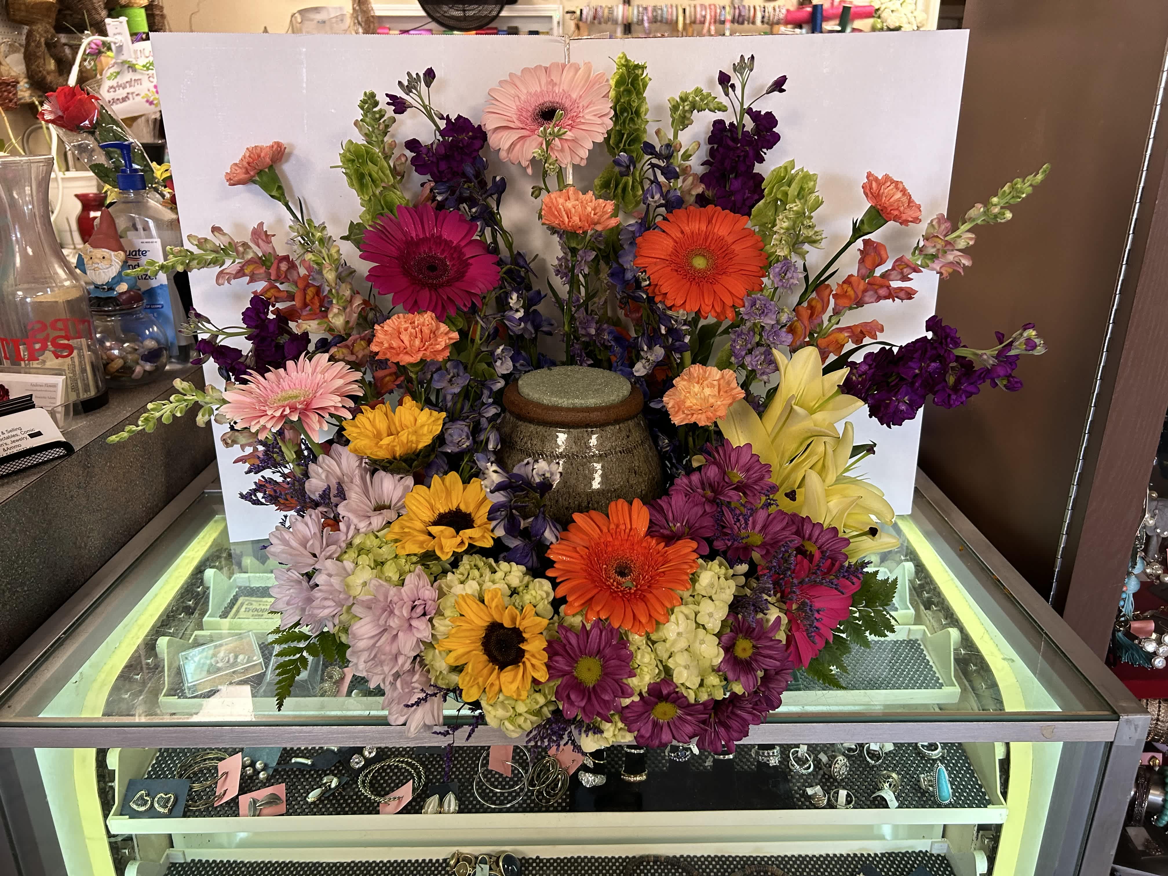 Colorful mixed flower arrangement with gerbera daisies and lilies