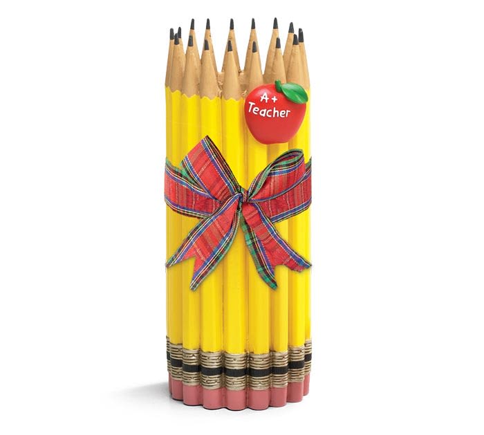 Bundle of yellow pencils tied with a plaid ribbon and apple teacher tag