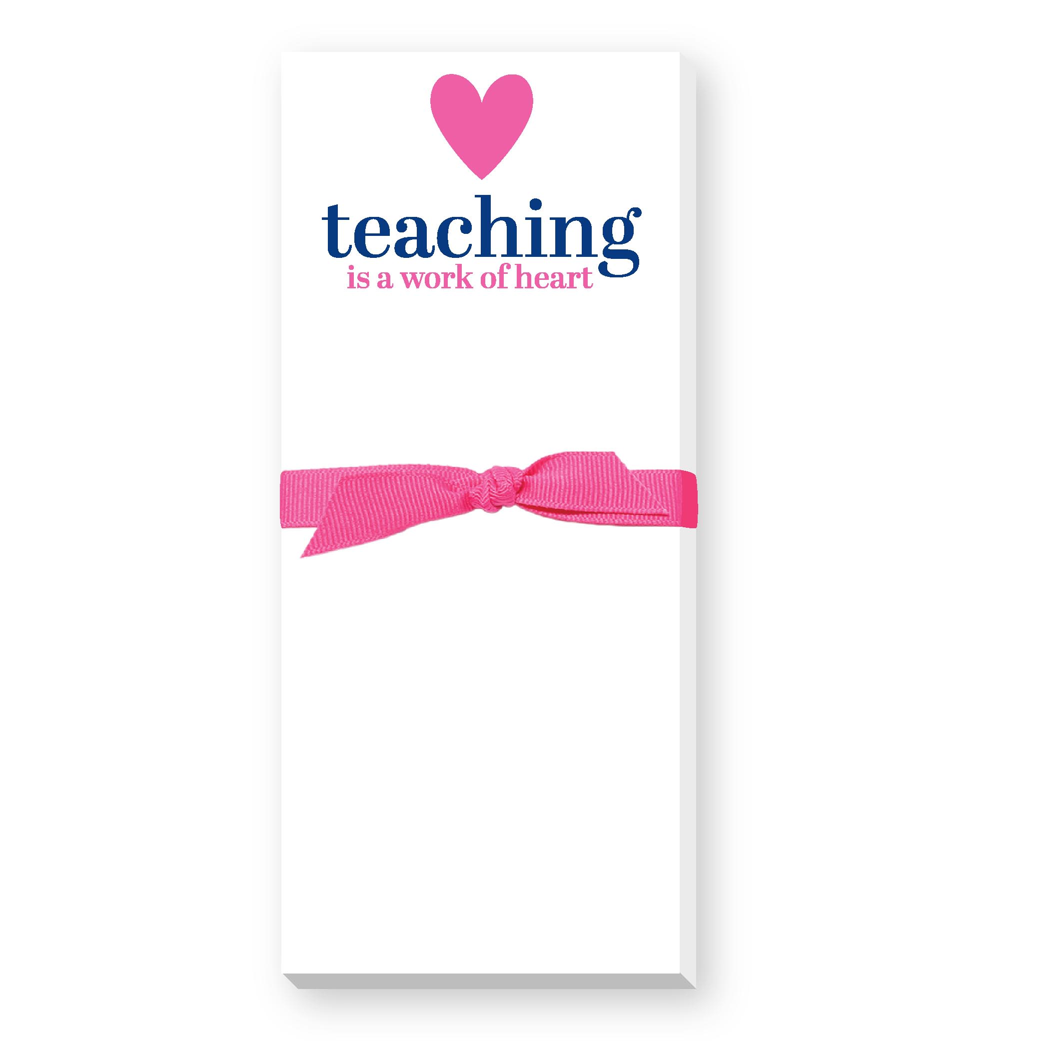 White gift box with a pink heart and teaching message, tied with a pink ribbon