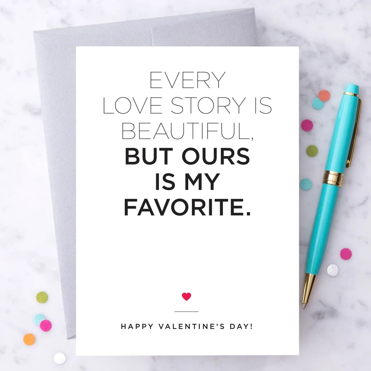 Valentine's Day card with a turquoise pen and confetti dots