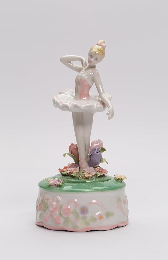 Porcelain ballerina figurine on a floral music box