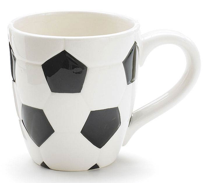 White mug with black soccer ball pattern