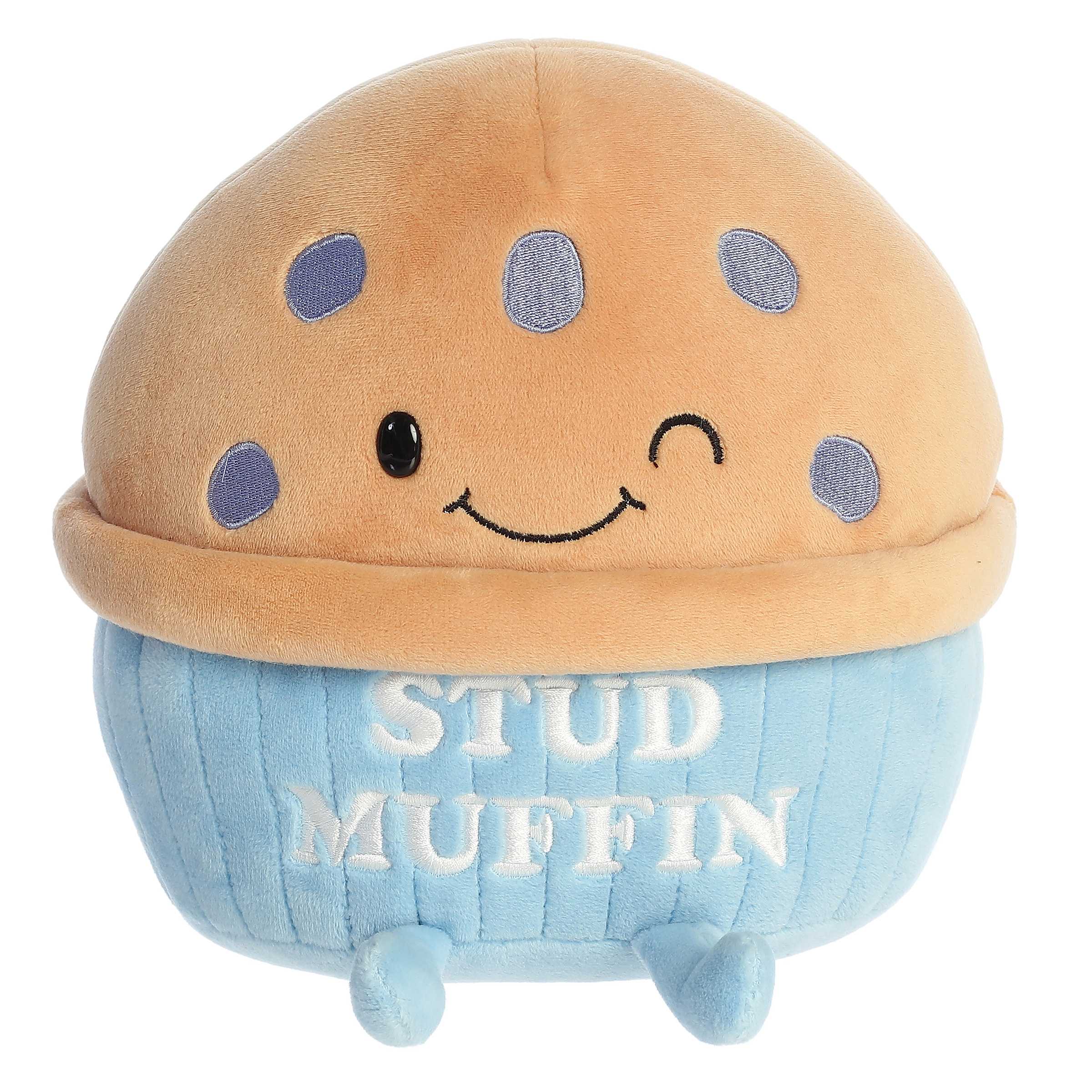 Plush- Stud Muffin  - A cute and cozy muffin-shaped plushie with a winking smile and soft, squishy texture. This little stud muffin adds a playful and charming touch to any space