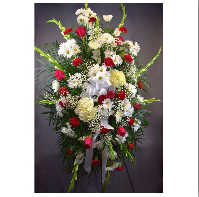 Standing floral spray with white daisies and red carnations