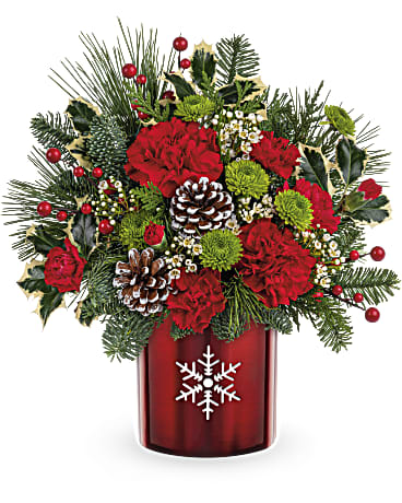 Christmas bouquet with red carnations in a red vase