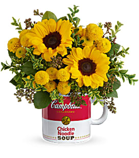 Sunflower bouquet arranged in a Campbell's soup mug