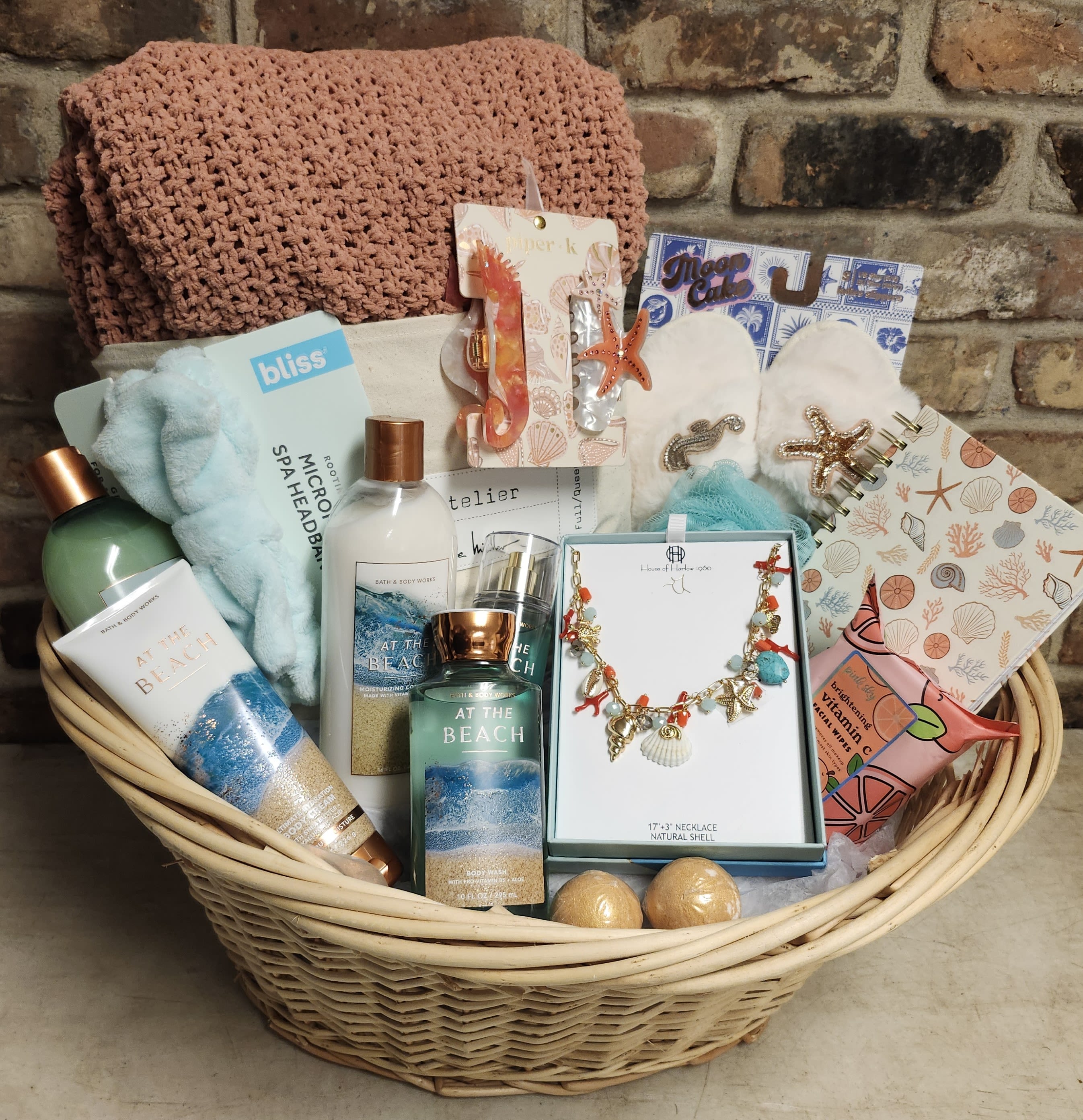 Gift basket with bath products, jewelry, and accessories