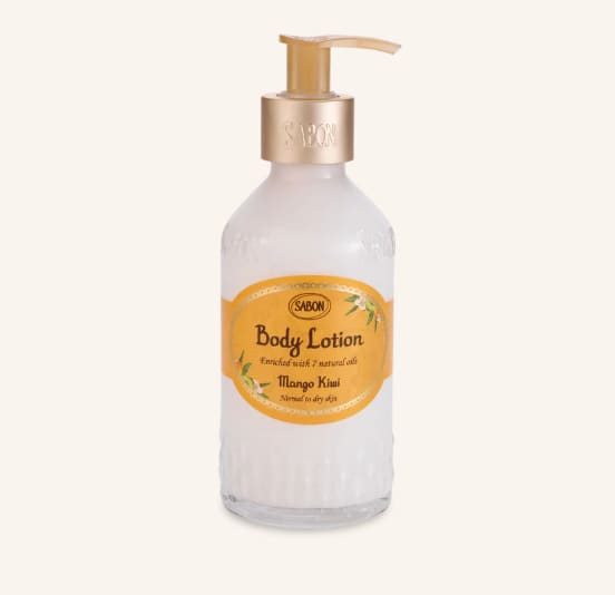 Bottle of Sabon mango kiwi body lotion with a pump dispenser