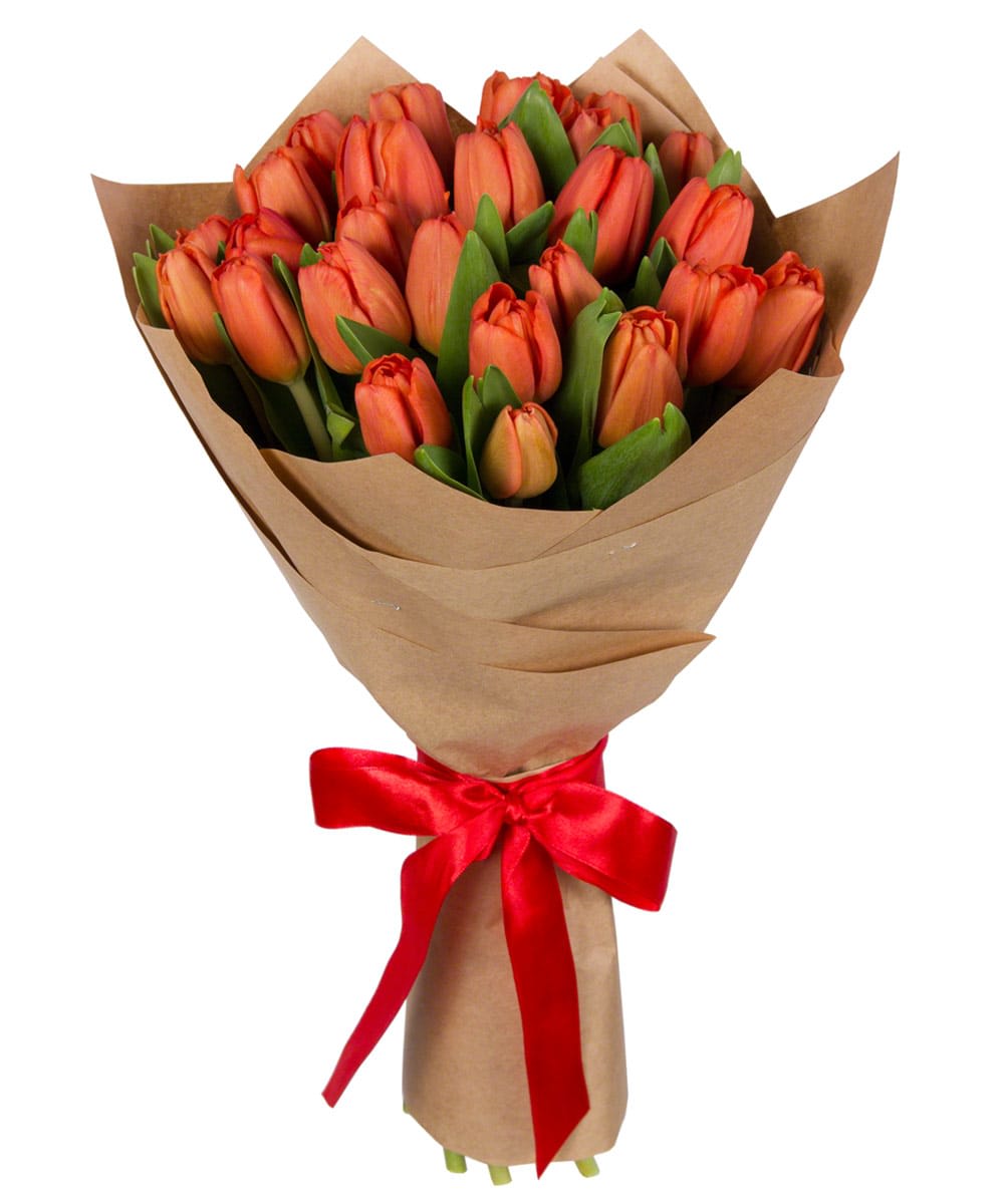 Bouquet of orange tulips wrapped in brown paper with a red ribbon