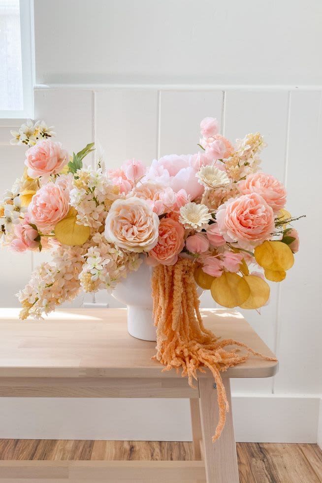 (NEW) Rose - This arrangement makes an extravagant gift for any celebratory occasion. Best for birthdays, weddings, and anniversaries, A combination of garden roses, orchids and other such premium flowers Only in M’NY Flowers
