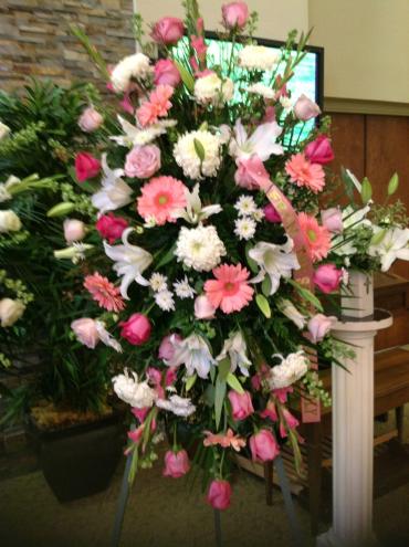Large standing floral spray with pink and white flowers