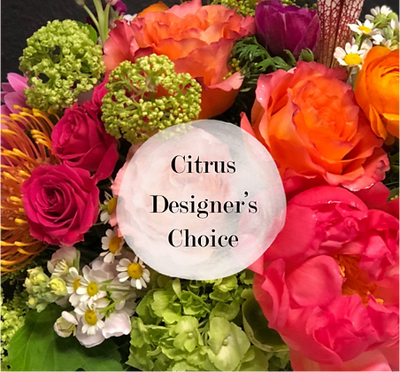 Bright mixed bouquet with orange and pink roses and green hydrangeas