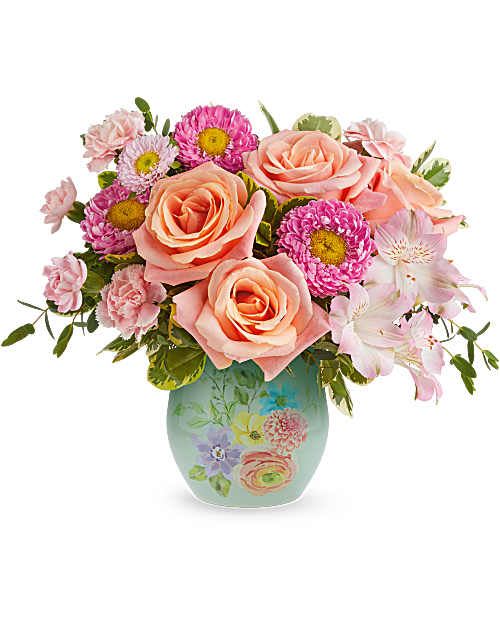 Watercolor garden -  Watercolor Garden Bouquet features peach roses, pink alstroemeria, miniature pink carnations, and pink Matsumoto asters, accented with parvifolia eucalyptus and variegated pittosporum, delivered in Teleflora's Watercolor Garden Vase. Orientation: All-Around