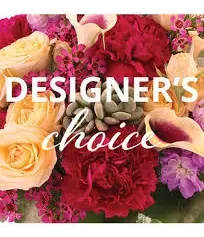Mixed bouquet of roses, calla lilies, and purple flowers