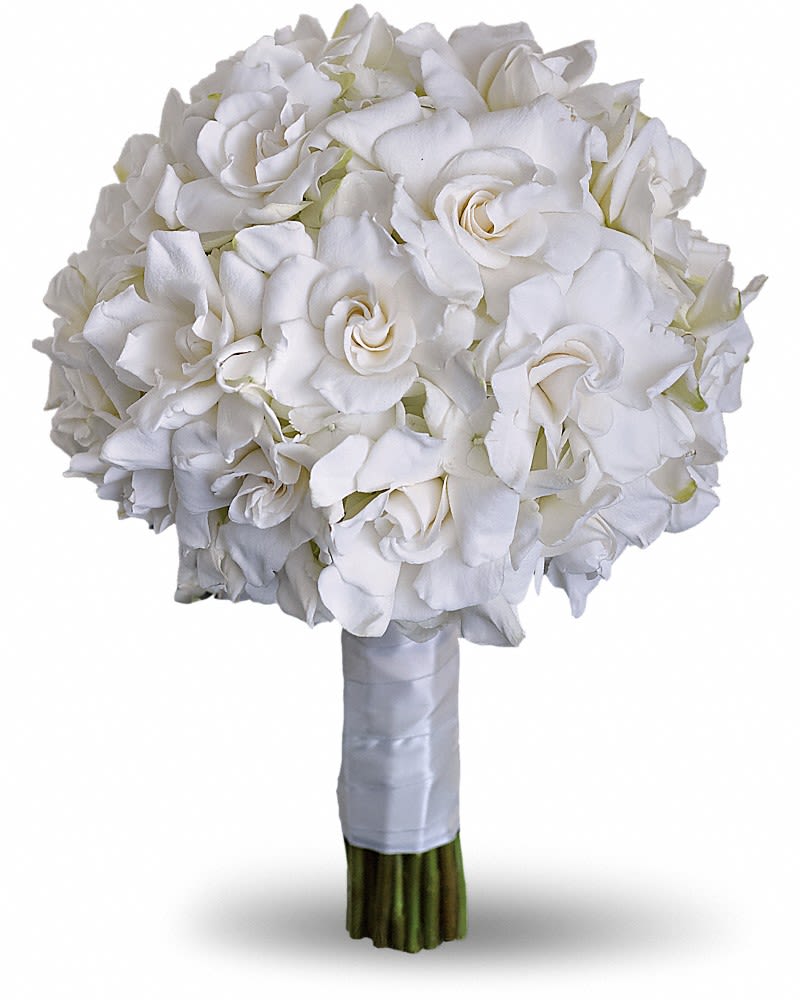 Gardenia and Grace Bouquet - Beloved for their enchanting fragrance, gardenias are gathered with hydrangea and roses into an elegant white bouquet. Gardenias and hydrangea are paired for a stunning all-white bouquet.